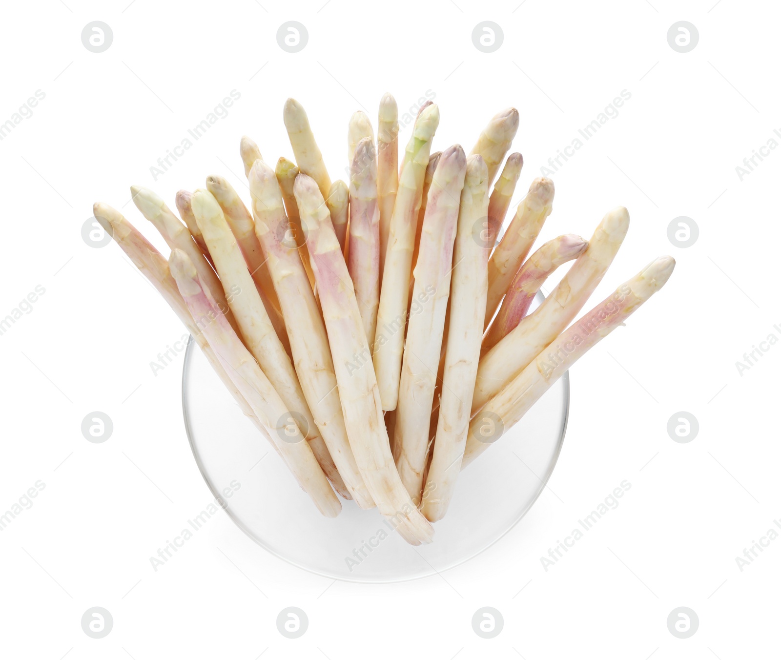 Photo of Fresh raw asparagus in glass bowl isolated on white, top view