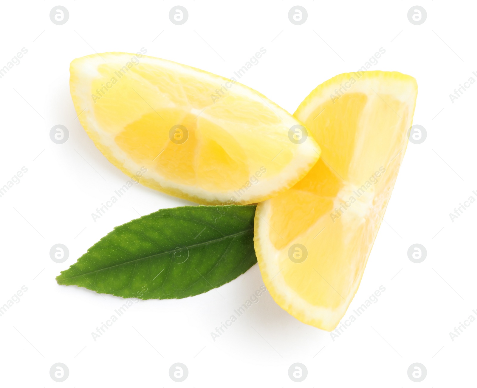 Photo of Pieces of ripe lemon with green leaf isolated on white, top view