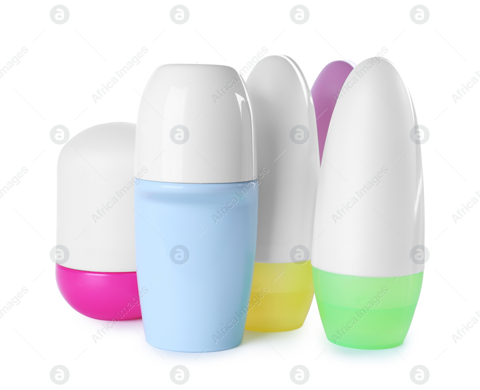 Photo of Different female roll-on deodorants on white background. Skin care