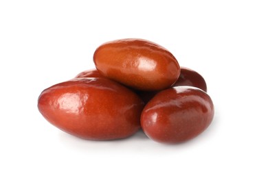 Photo of Heap of ripe red dates on white background