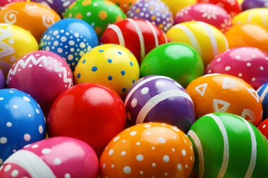 Many decorated Easter eggs as background. Festive tradition