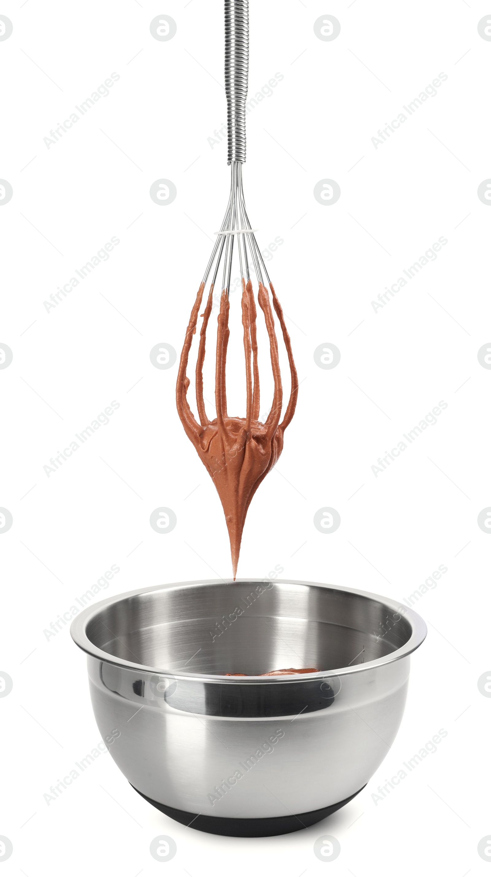 Photo of Chocolate cream flowing from whisk into bowl on white background