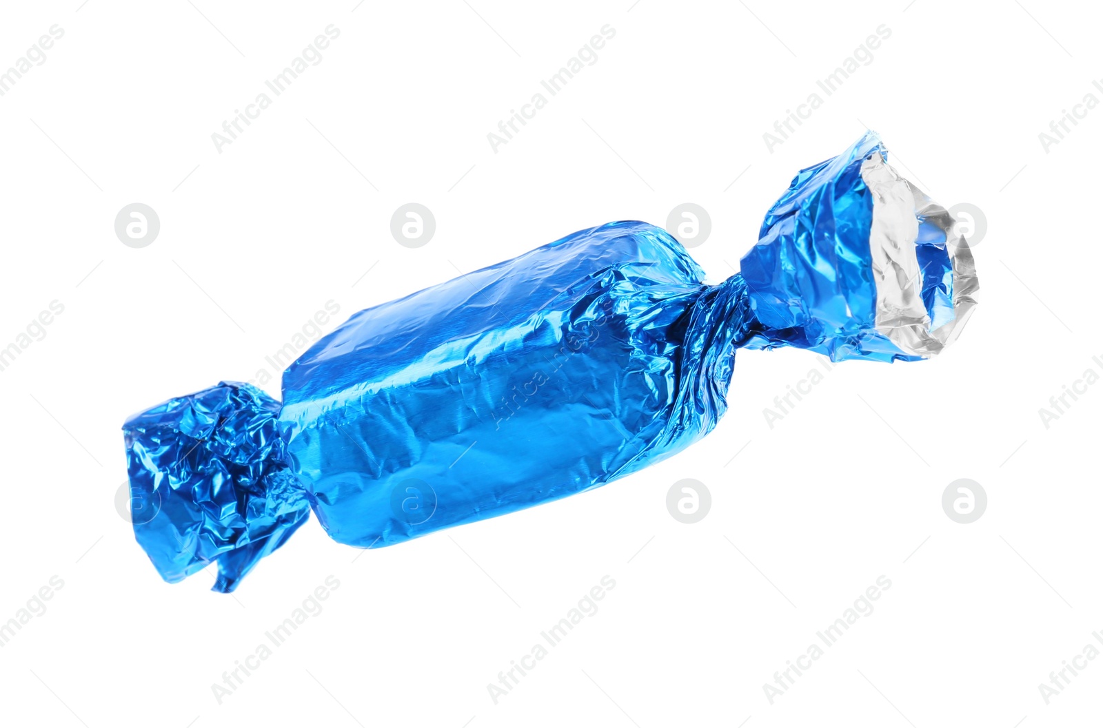 Photo of Tasty candy in light blue wrapper isolated on white