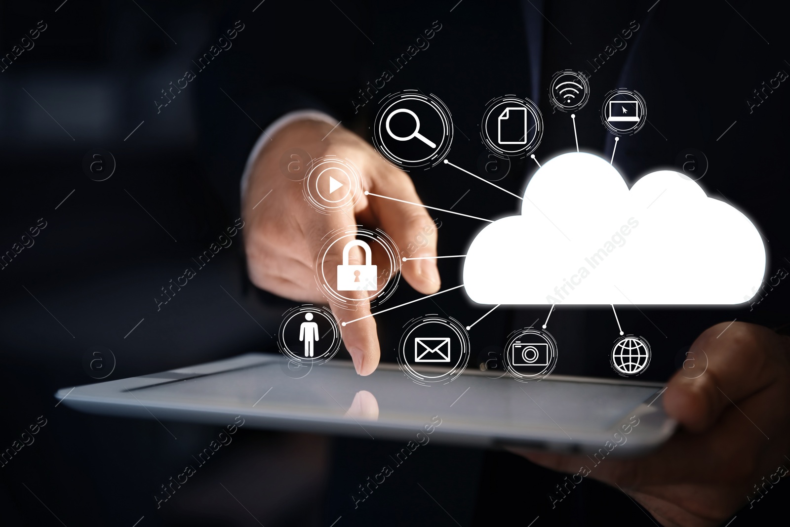 Image of Cloud computing and storage concept. Businessman using tablet on dark background, closeup