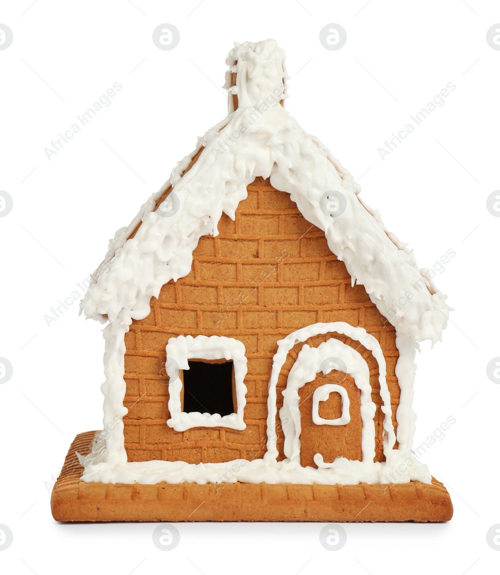 Photo of Beautiful gingerbread house decorated with icing on white background