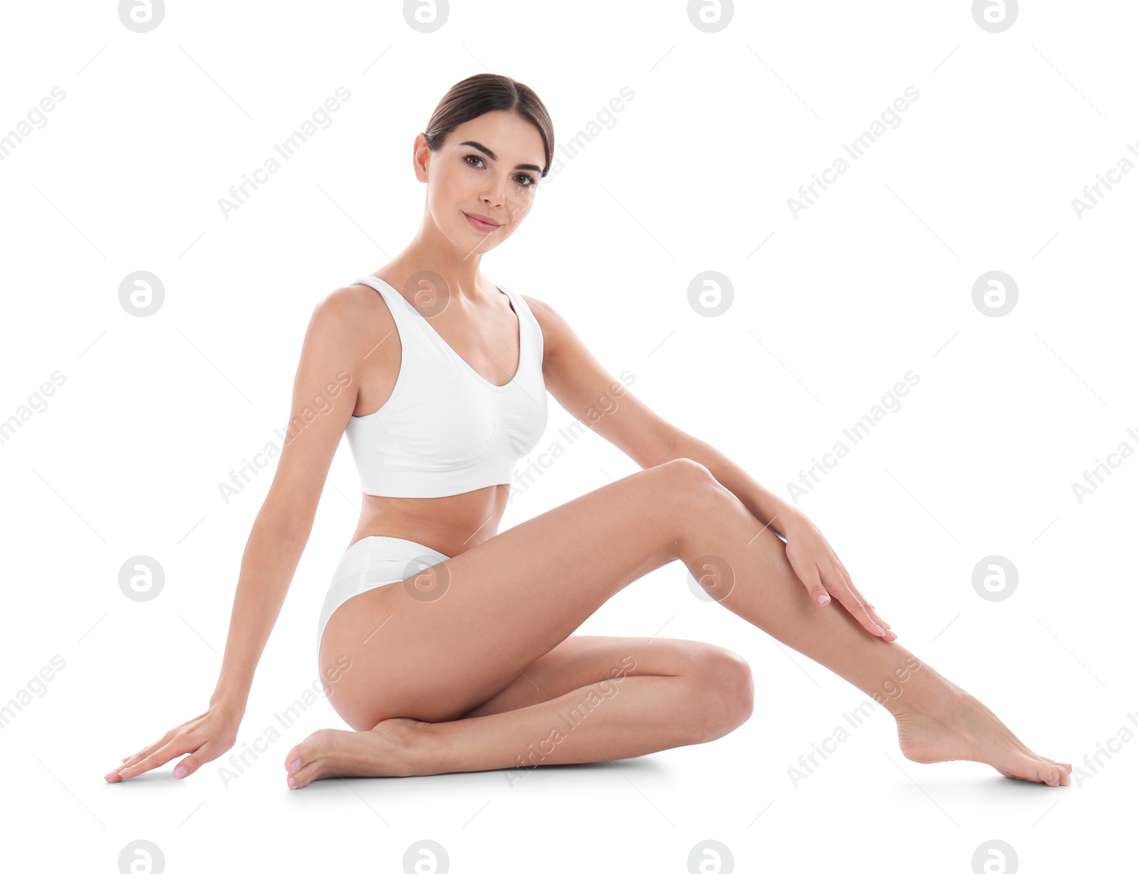 Photo of Young woman with perfect skin on white background. Beauty and body care
