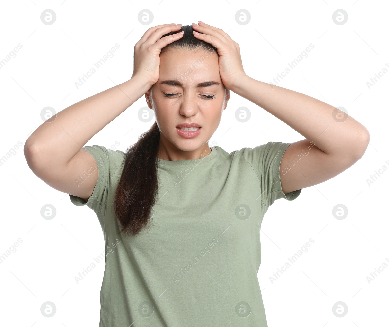 Photo of Young woman suffering from headache on white background