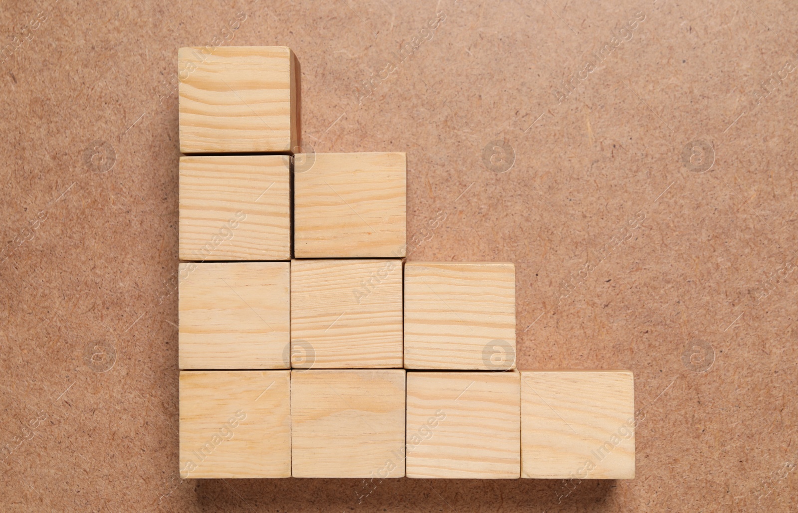 Photo of Many cubes on wooden background, flat lay. Management concept