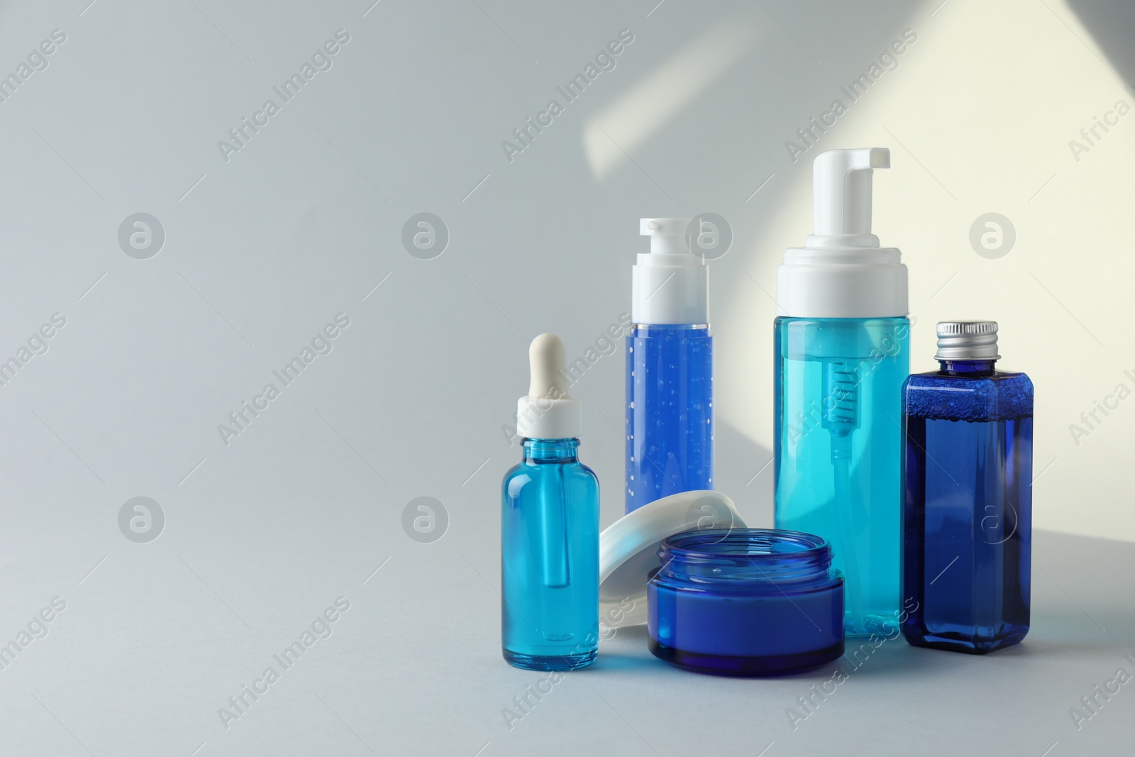 Photo of Set of luxury cosmetic products on white background. Space for text