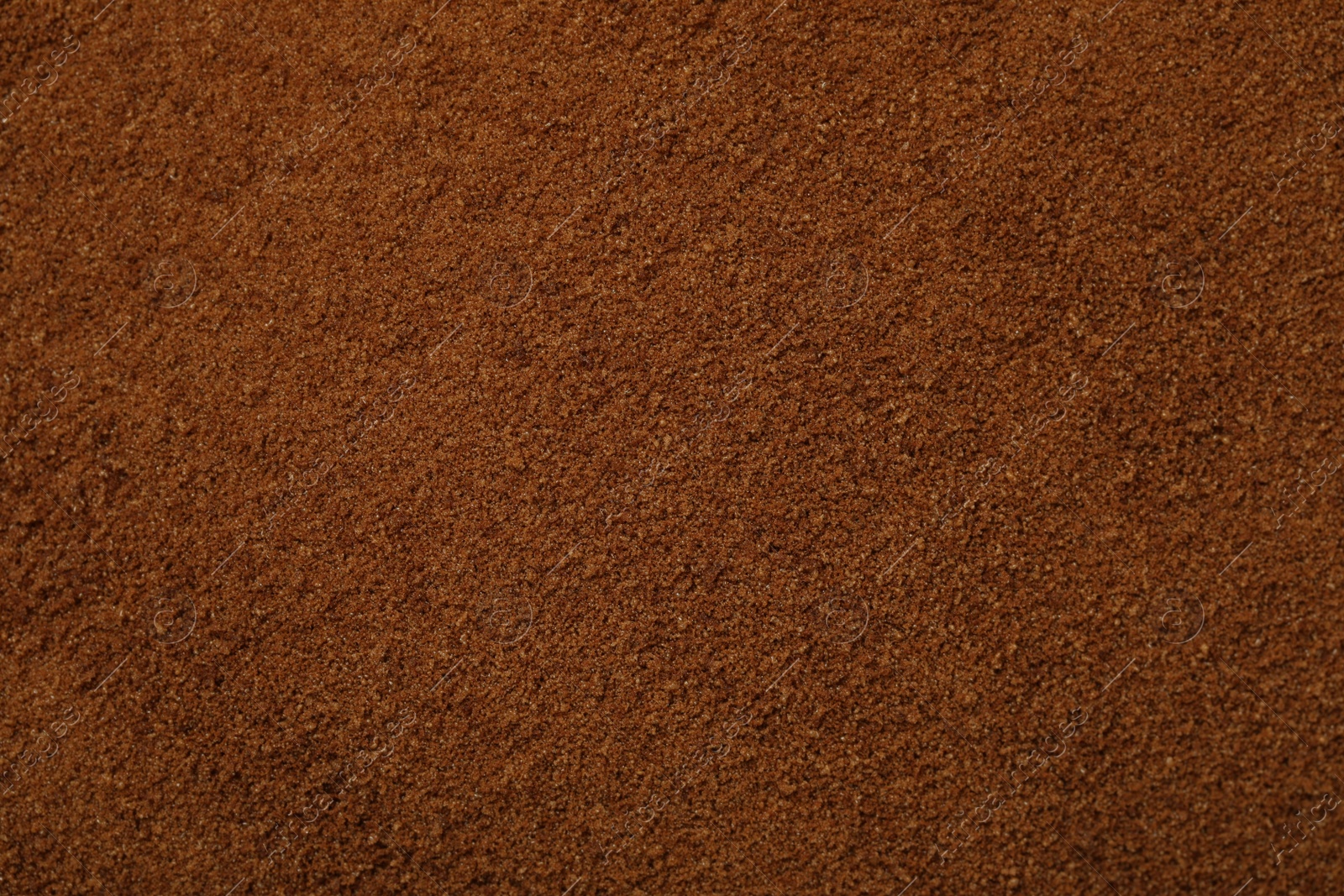 Photo of Pile of chicory powder as background, top view