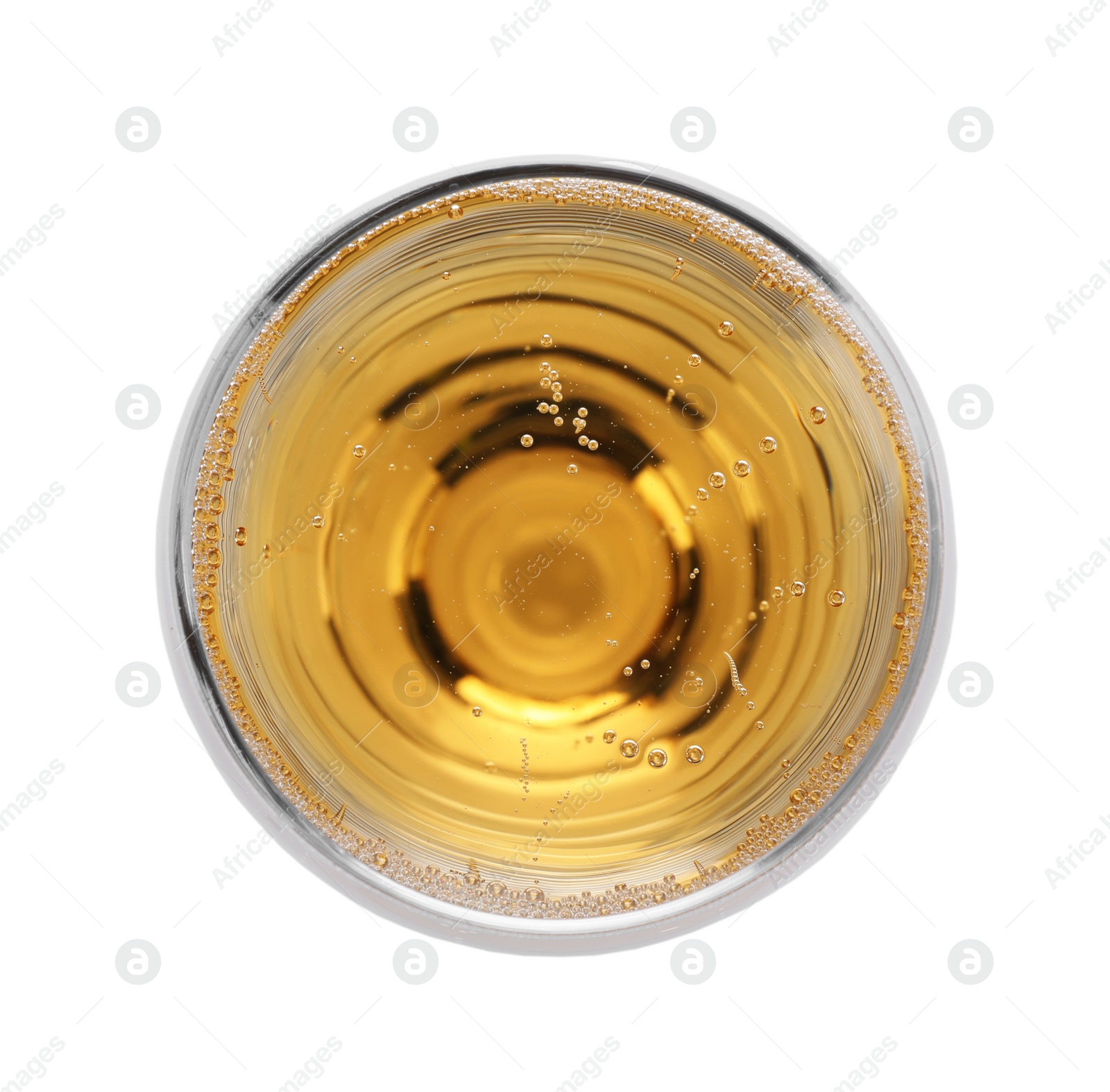 Photo of Glass of champagne on white background, top view. Festive drink