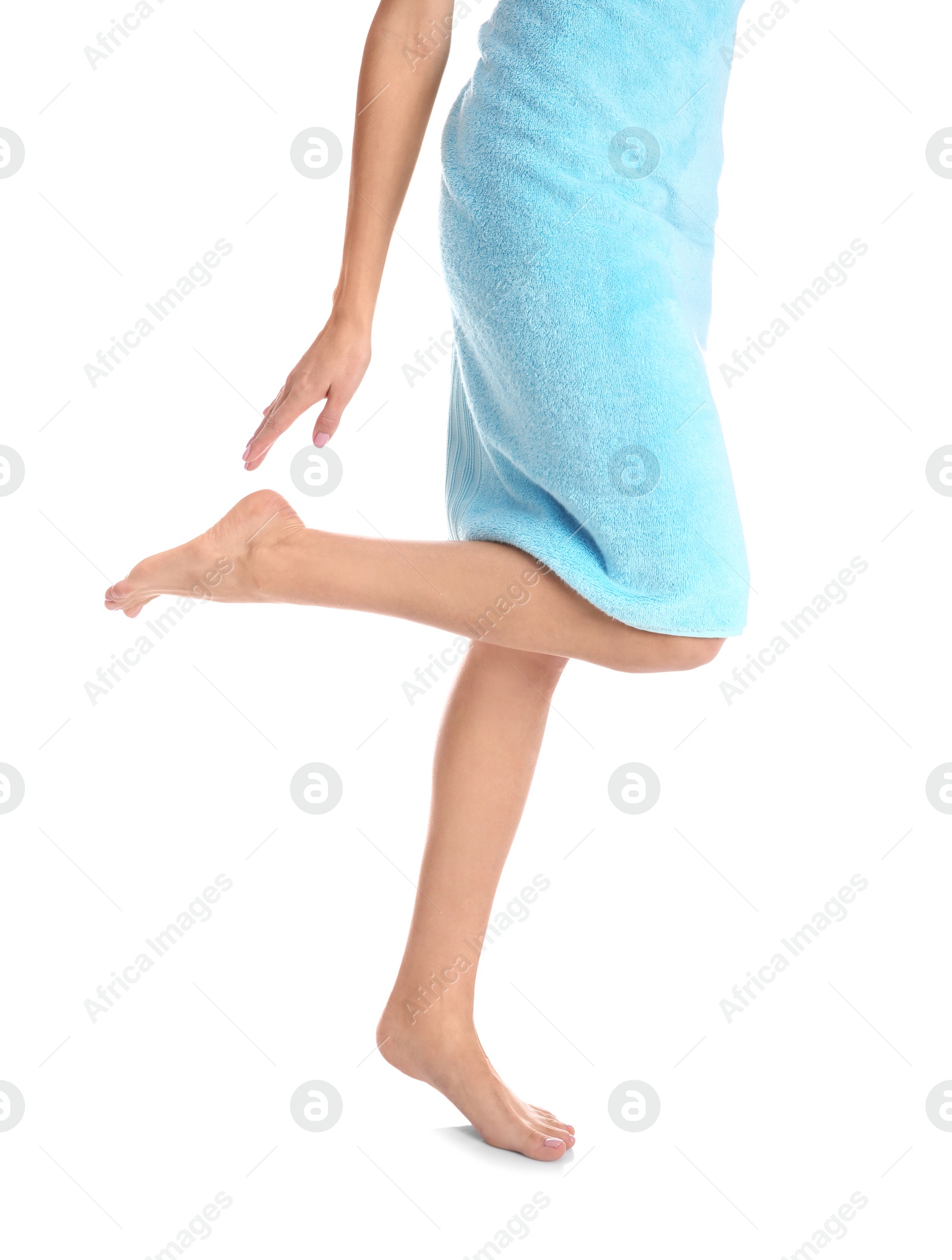 Photo of Woman with beautiful legs and feet on white background, closeup. Spa treatment