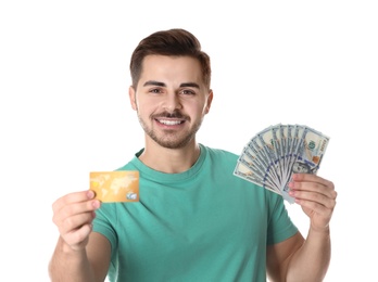 Photo of Portrait of happy young man with money and credit card on white background