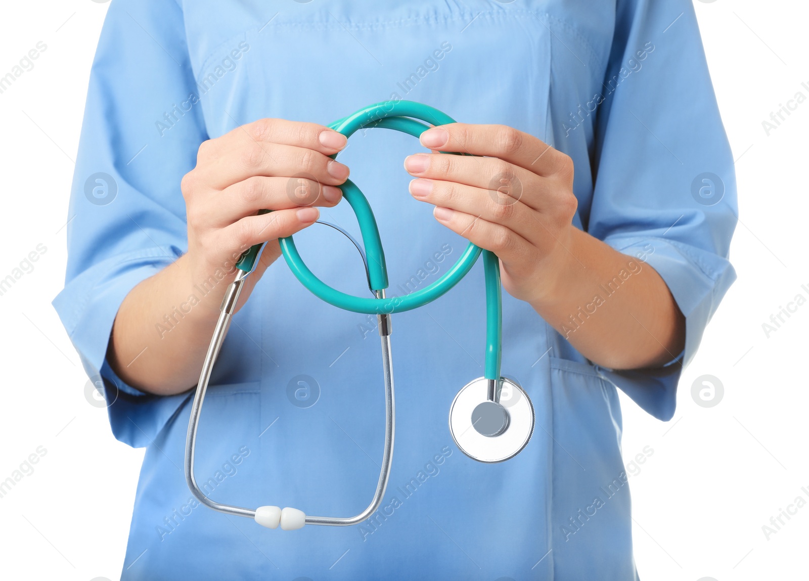 Photo of Female doctor with stethoscope on white background, closeup. Medical object