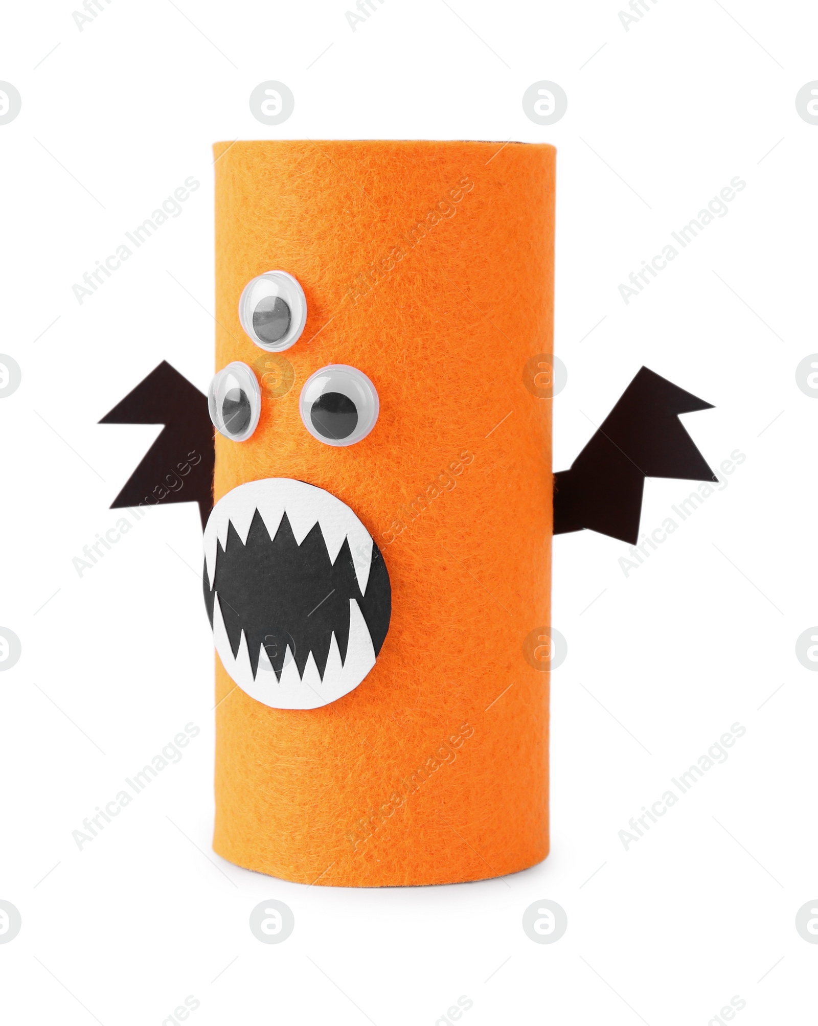 Photo of Monster made of orange felt isolated on white. Halloween decoration