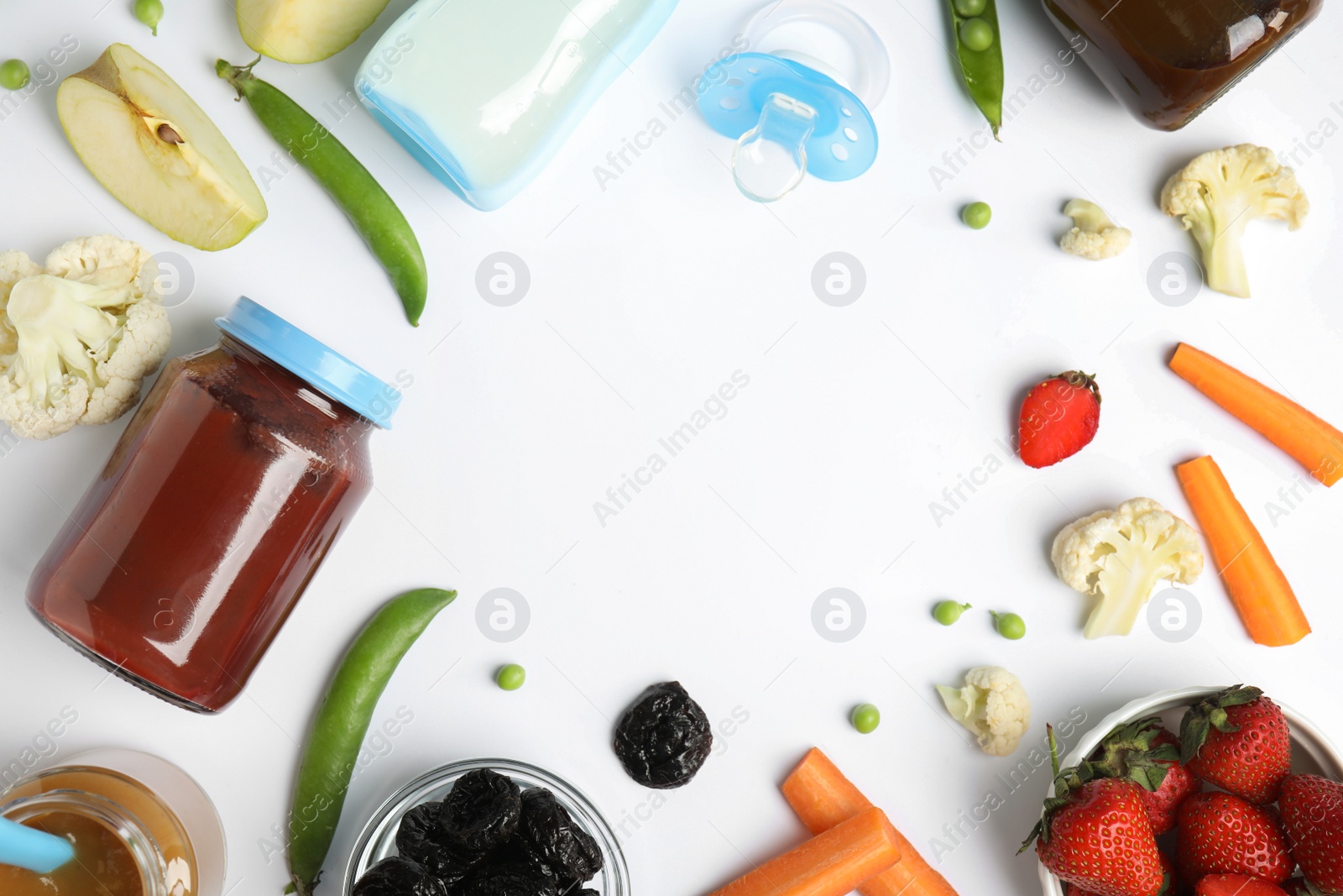 Photo of Frame of baby food, ingredients and accessories on white background, flat lay. Space for text