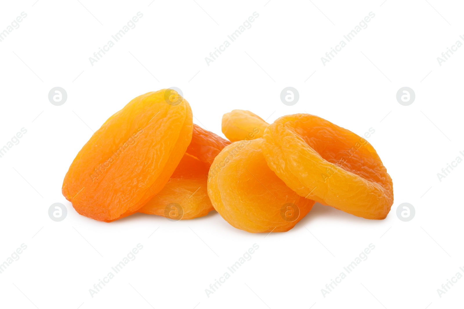 Photo of Pile of tasty apricots on white background. Dried fruits