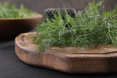 Fresh dill on grey table, closeup view