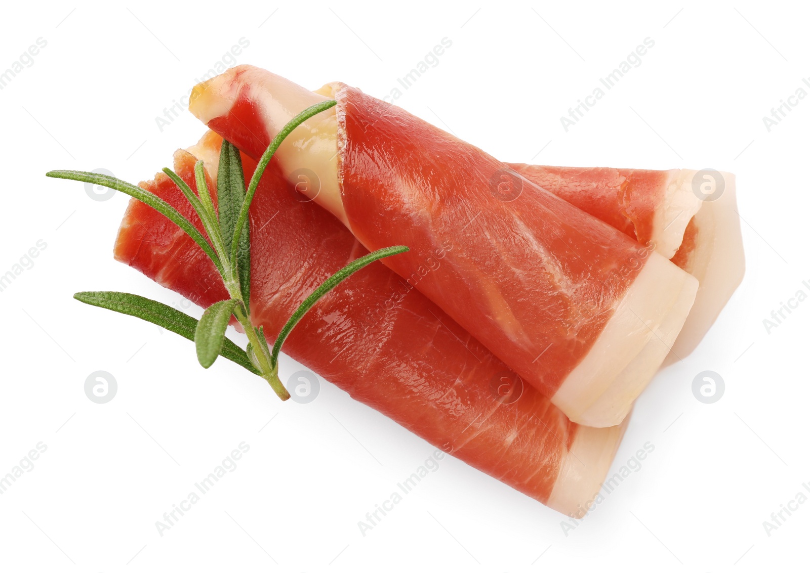 Photo of Slices of delicious jamon with rosemary on white background, top view