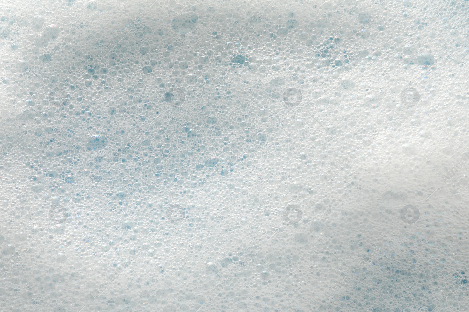 Photo of White washing foam as background, top view