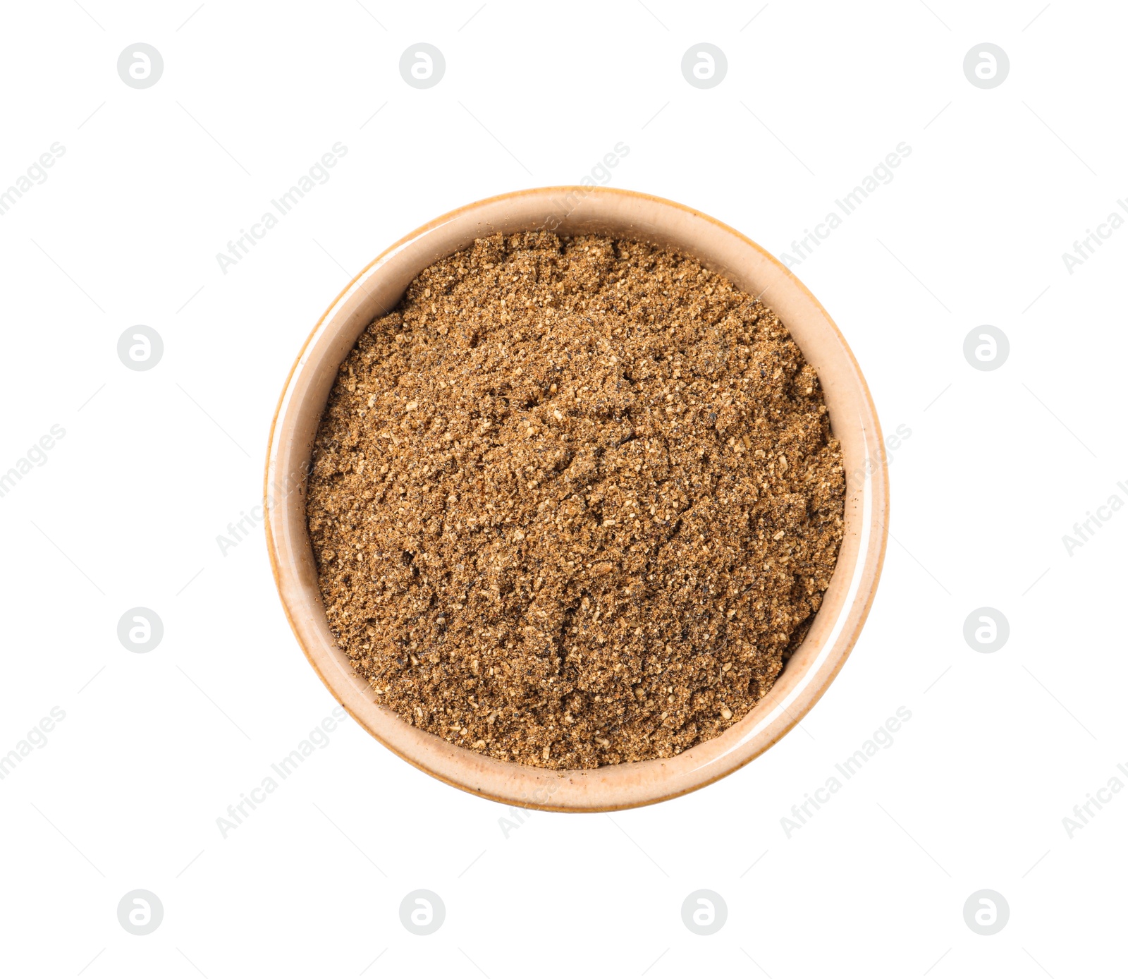 Photo of Bowl of aromatic caraway (Persian cumin) powder isolated on white, top view