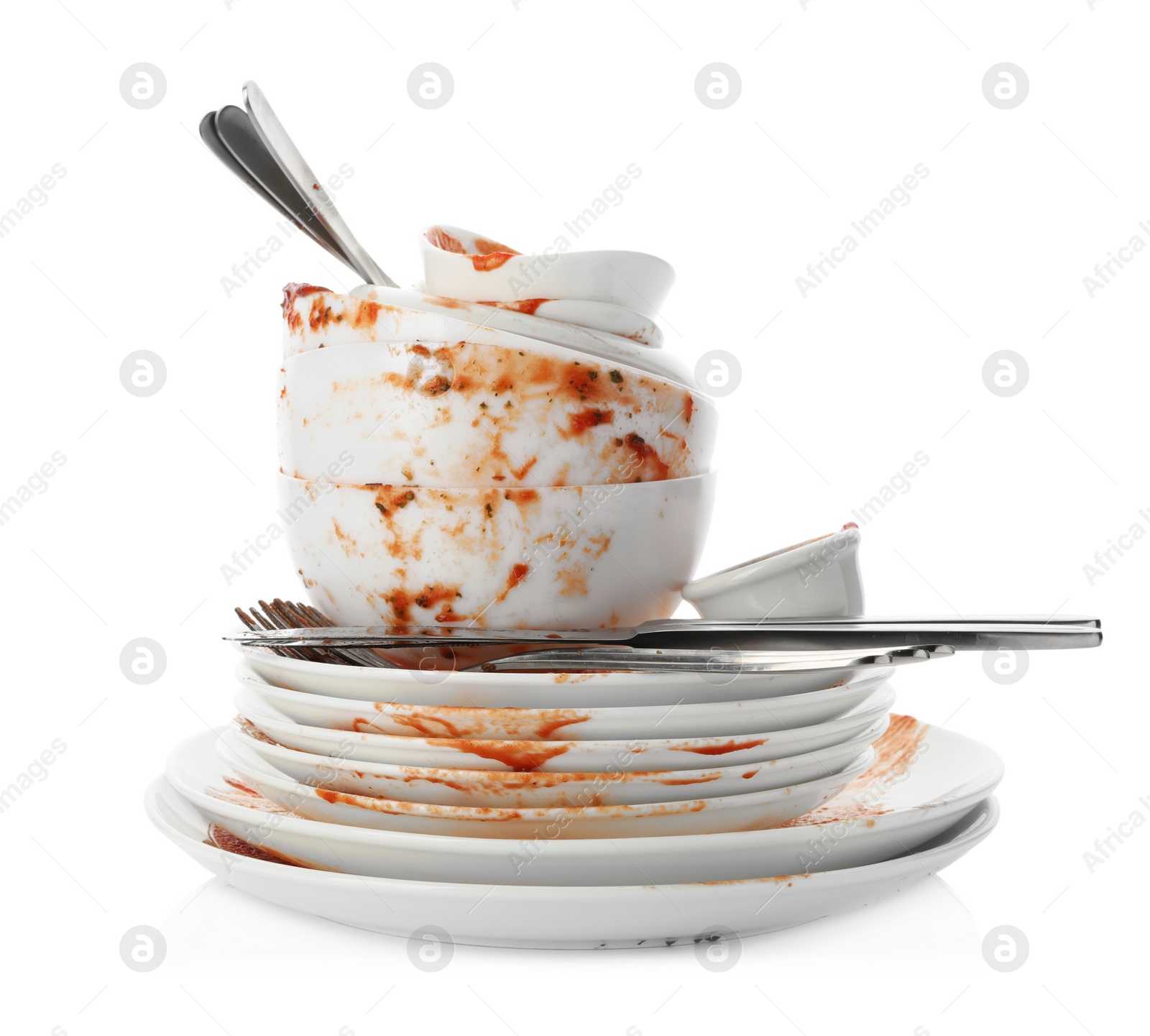 Photo of Set of dirty dishes isolated on white