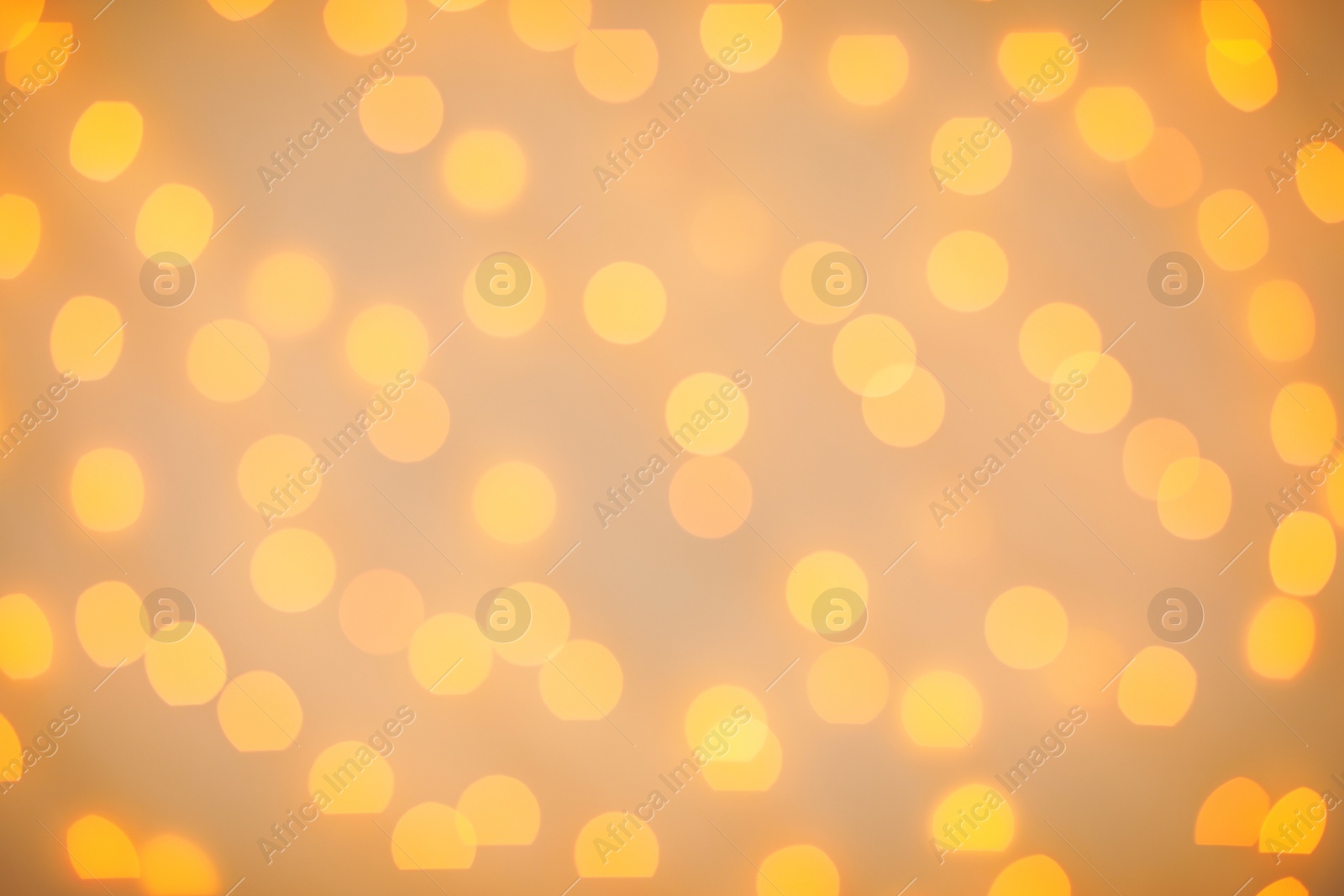 Photo of Beautiful gold lights as background. Bokeh effect