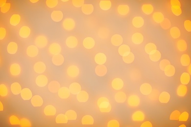 Photo of Beautiful gold lights as background. Bokeh effect