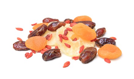 Pile of different tasty dried fruits on white background