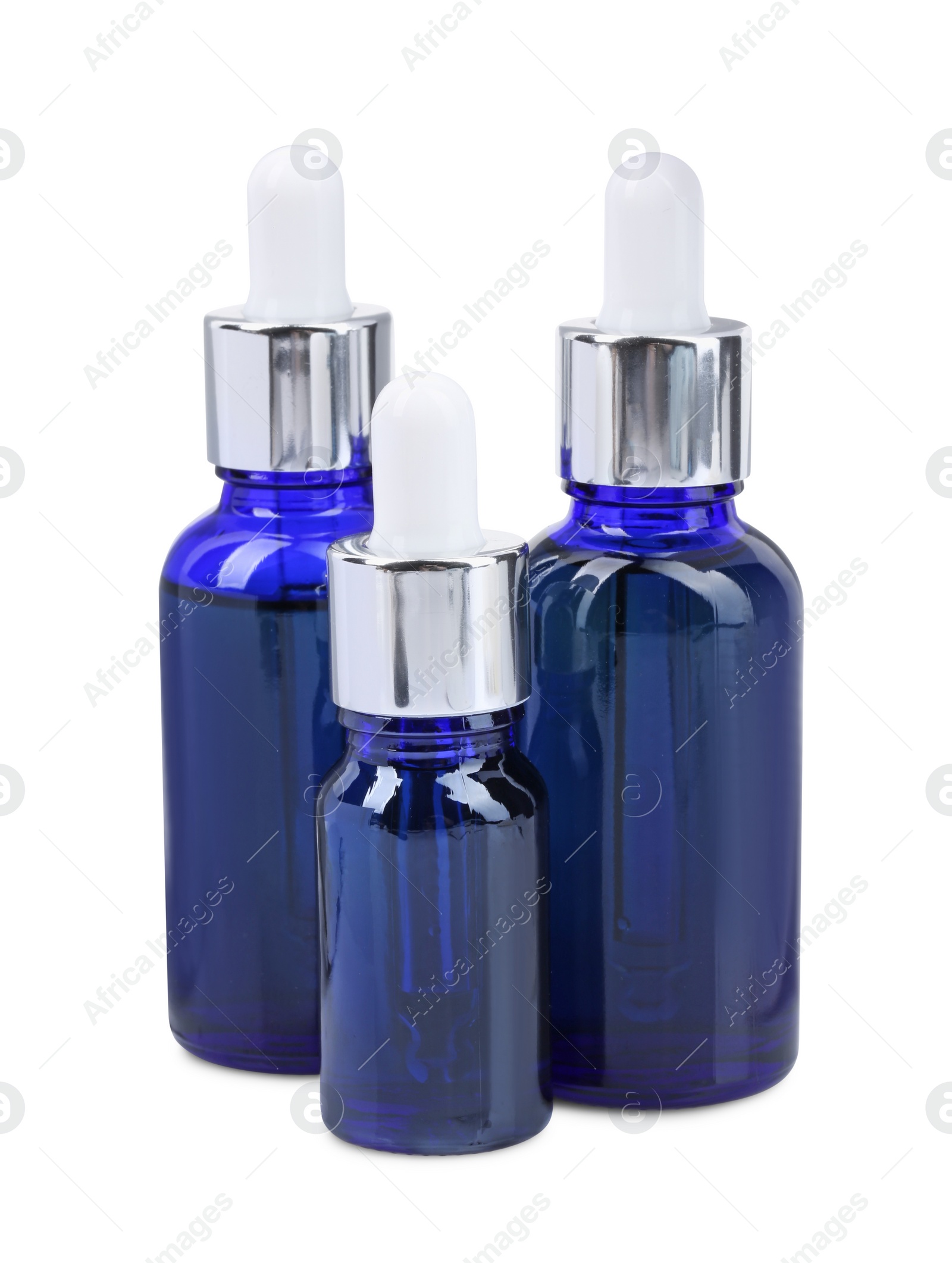 Photo of Blue bottles with tincture isolated on white