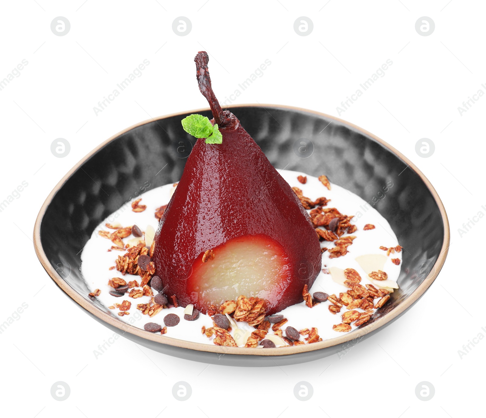 Photo of Tasty red wine poached pear with muesli and yoghurt isolated on white