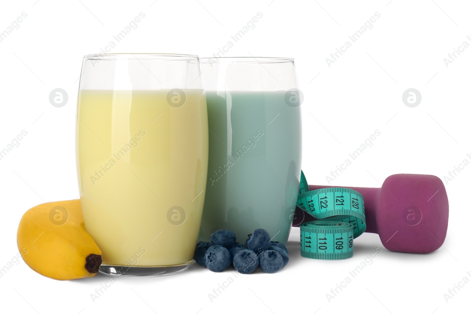 Photo of Tasty shakes, banana, blueberries, dumbbell and measuring tape isolated on white. Weight loss