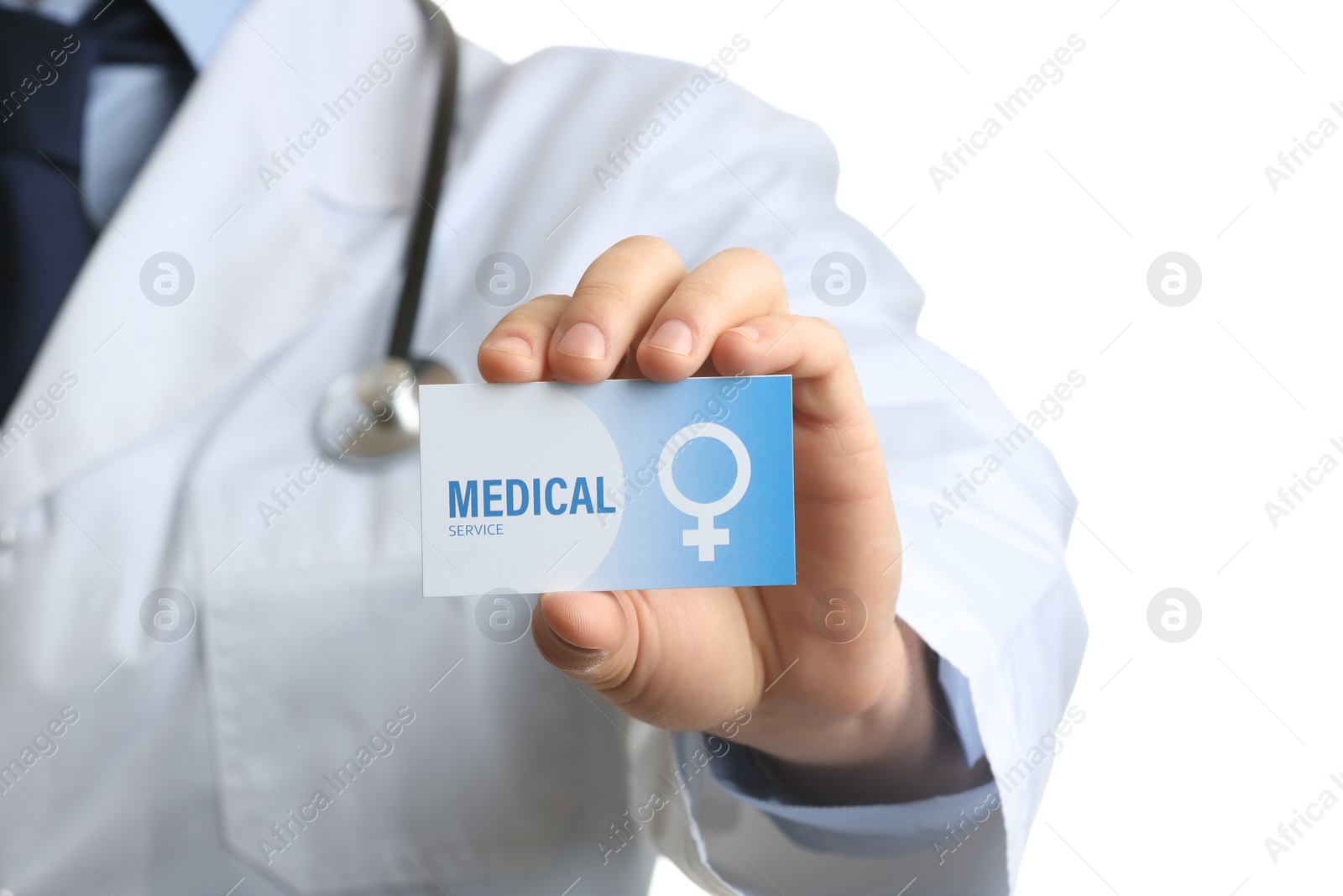 Photo of Gynecologist holding business card isolated on white, closeup. Medical service