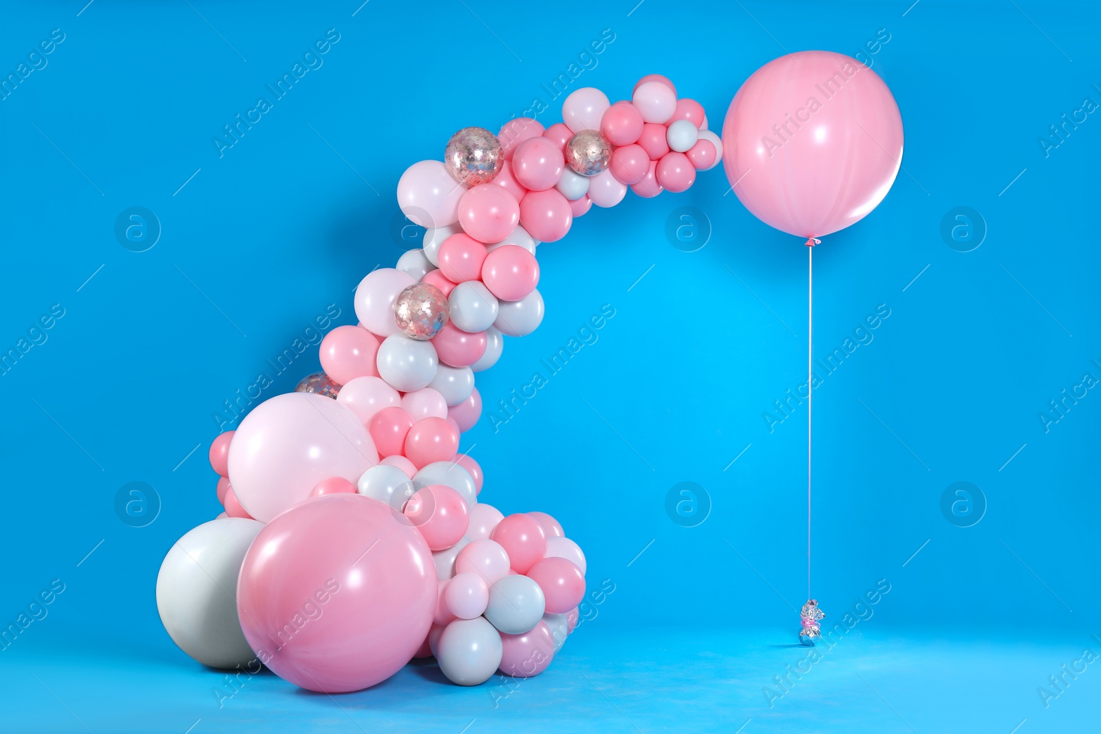 Photo of Beautiful composition with balloons on blue background