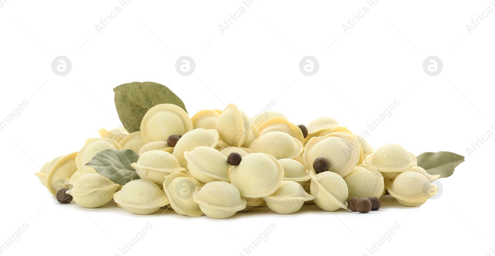 Photo of Raw meat dumplings with bay leaves and pepper on white background