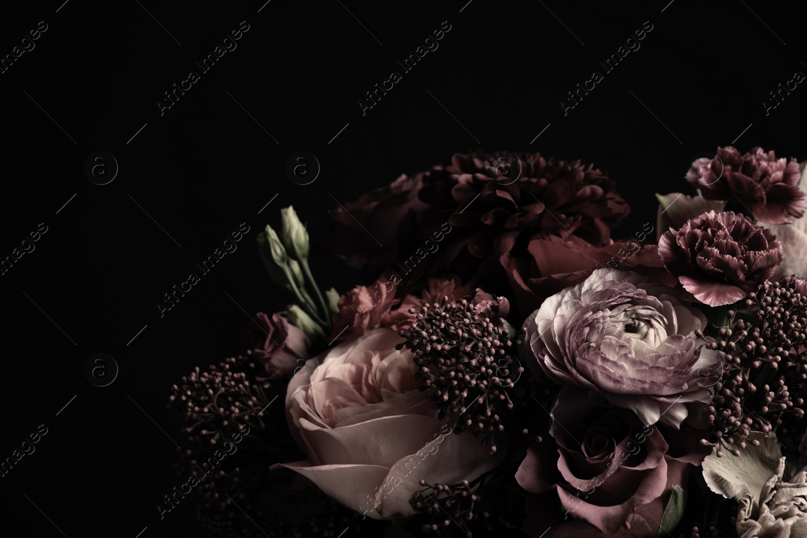 Photo of Beautiful bouquet of different flowers on black background. Floral card design with dark vintage effect