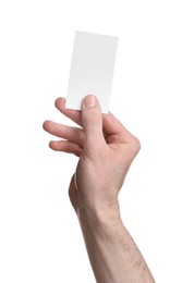Man holding blank business card on white background, closeup