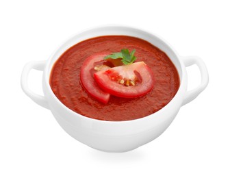 Photo of Delicious tomato cream soup in bowl isolated on white
