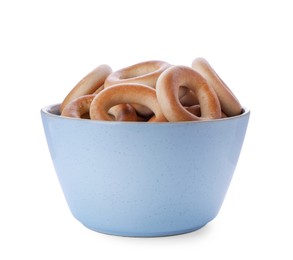 Bowl with tasty dry bagels (sushki) isolated on white