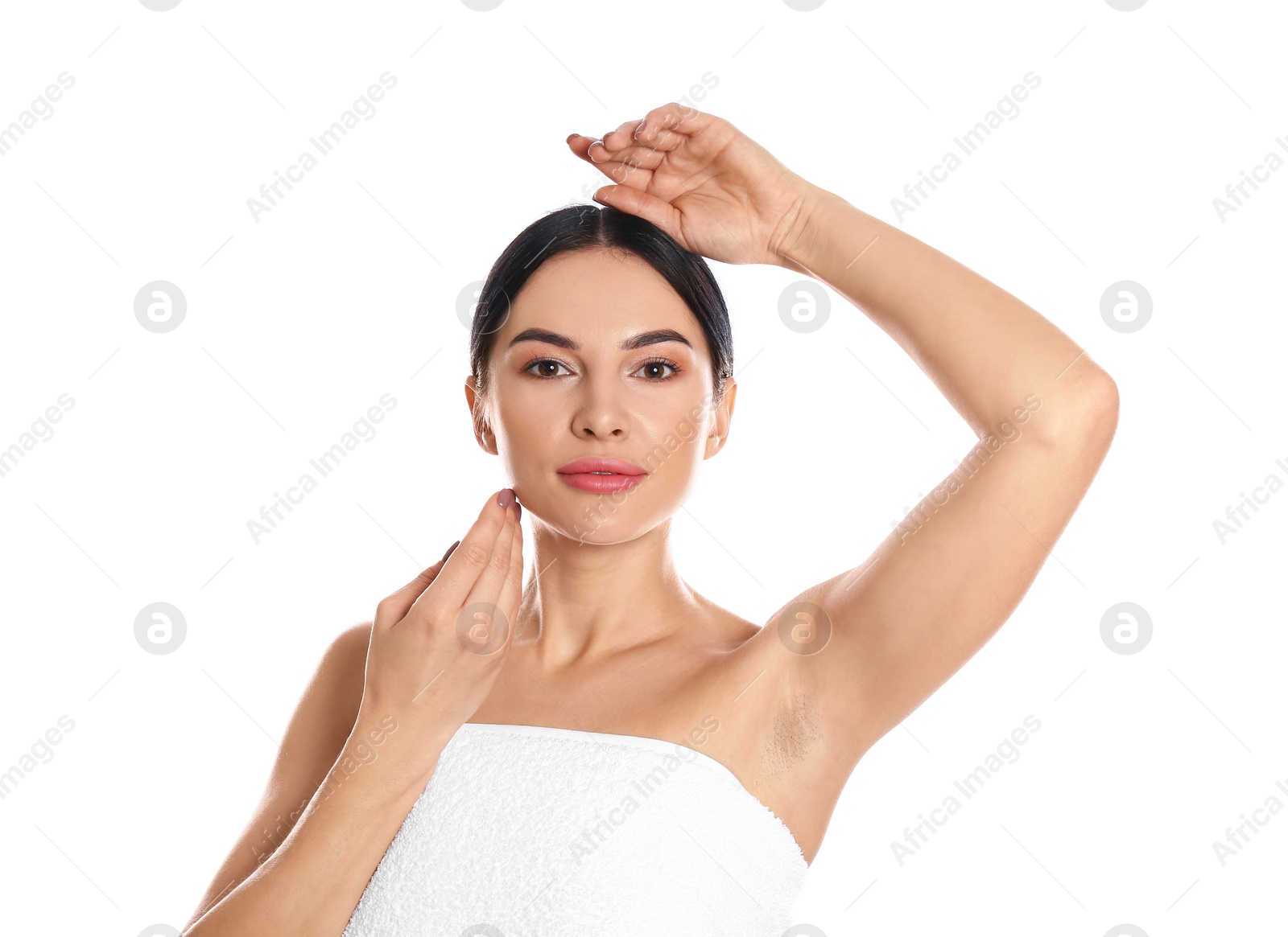 Photo of Young woman showing hairy armpit on white background. Epilation procedure
