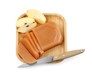 Delicious sweet quince paste, knife and fresh fruit isolated on white, top view