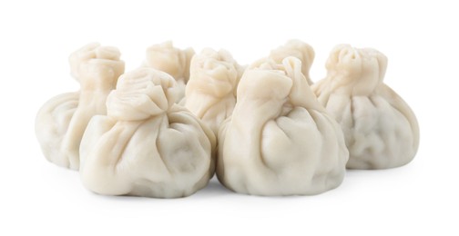 Many tasty khinkali (dumplings) isolated on white. Georgian cuisine