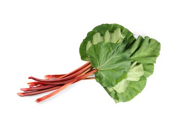 Photo of Fresh rhubarb stalks with leaves isolated on white, top view