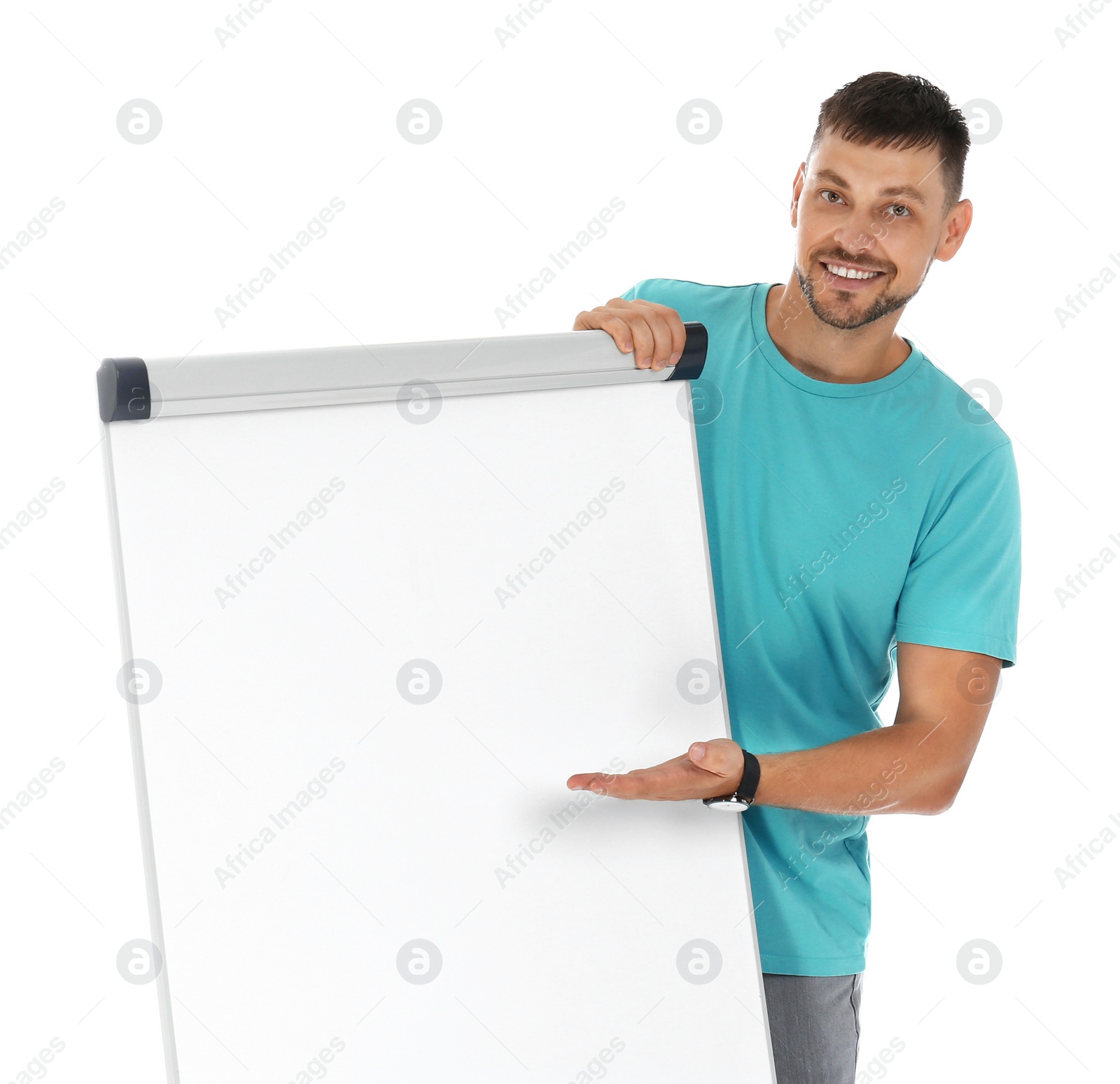 Photo of Professional business trainer near flip chart board on white background. Space for text