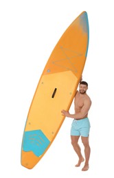 Happy man with orange SUP board on white background