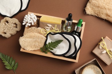 Photo of Flat lay composition with eco friendly products on brown background
