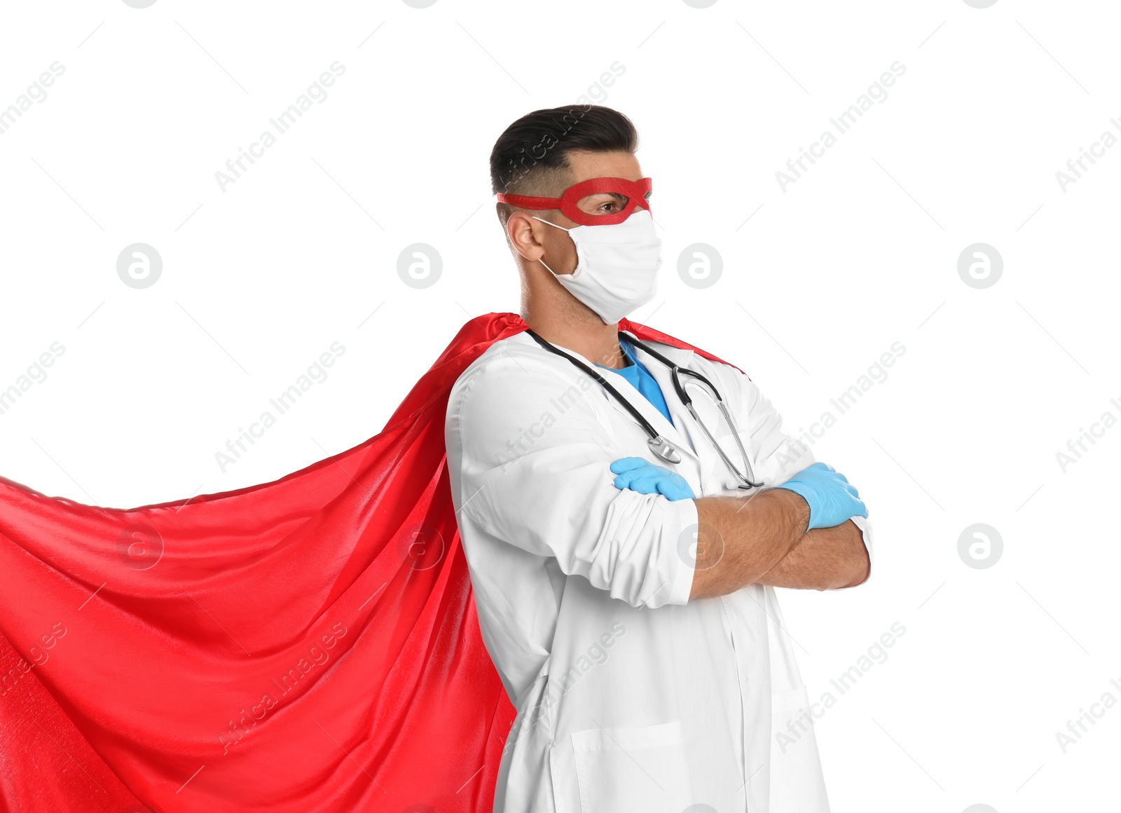 Photo of Doctor wearing face mask and cape on white background. Super hero power for medicine