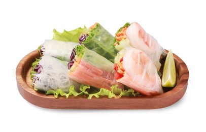 Photo of Tasty spring rolls served with lime on white background