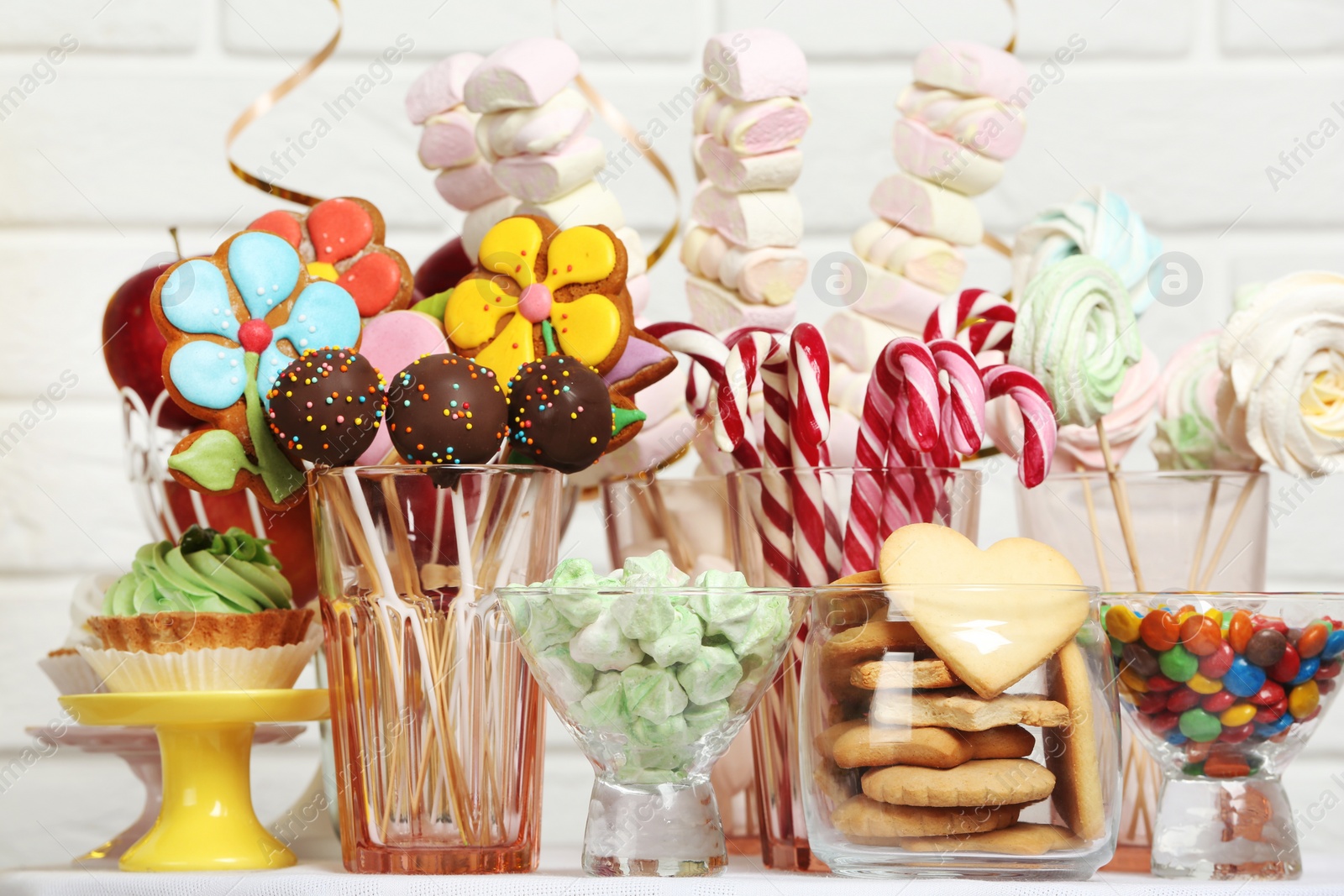 Photo of Candy bar with delicious treats for birthday party