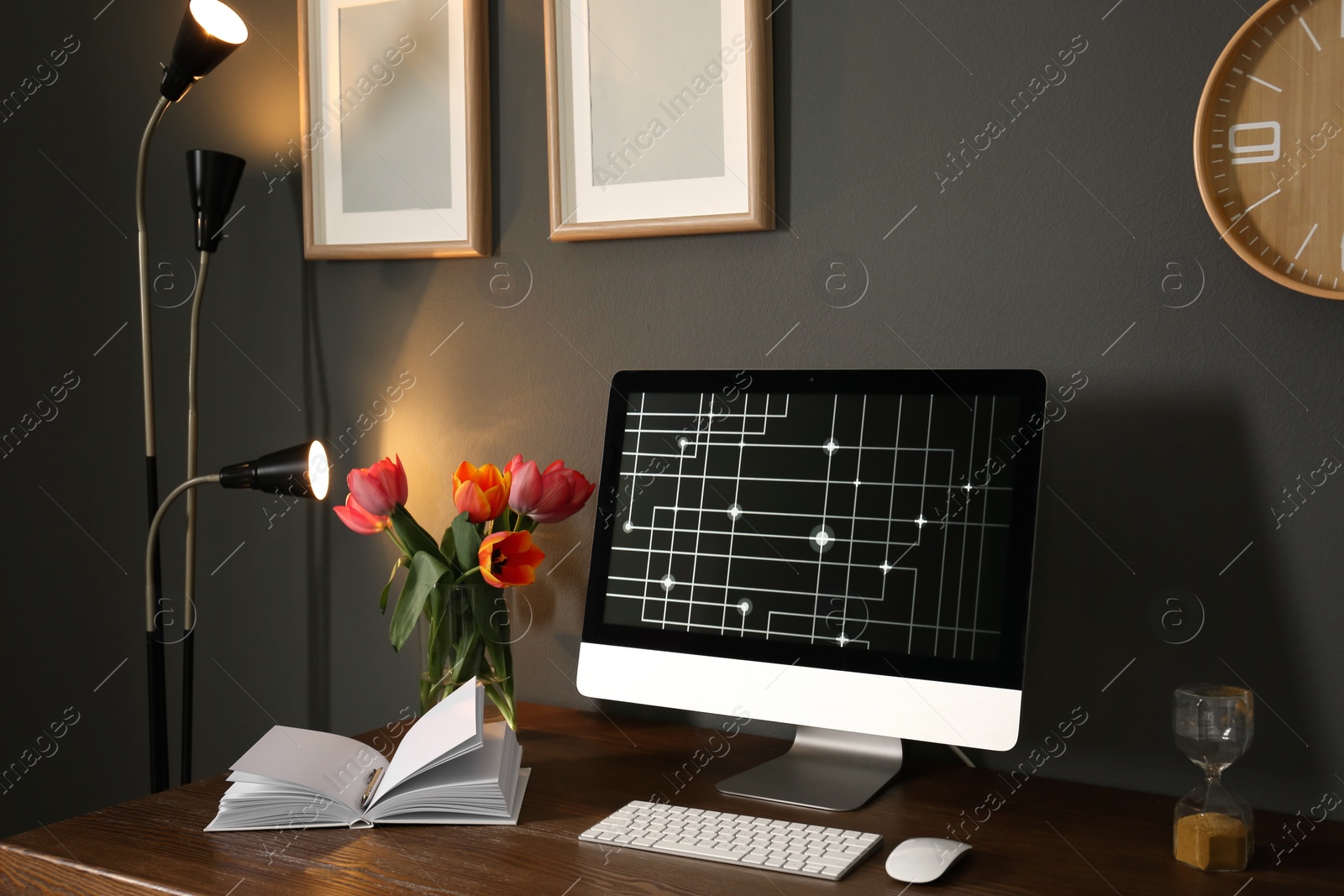 Photo of Stylish modern workplace with computer at home